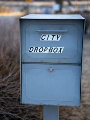 Outdoor city dropbox against blurred rural backdrop in Wabasha, Minnesota.