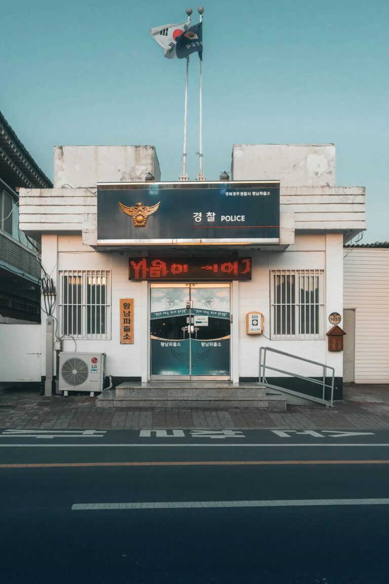 Photograph of a quaint police station in Gyeongju, South Korea, capturing the peaceful evening setting.